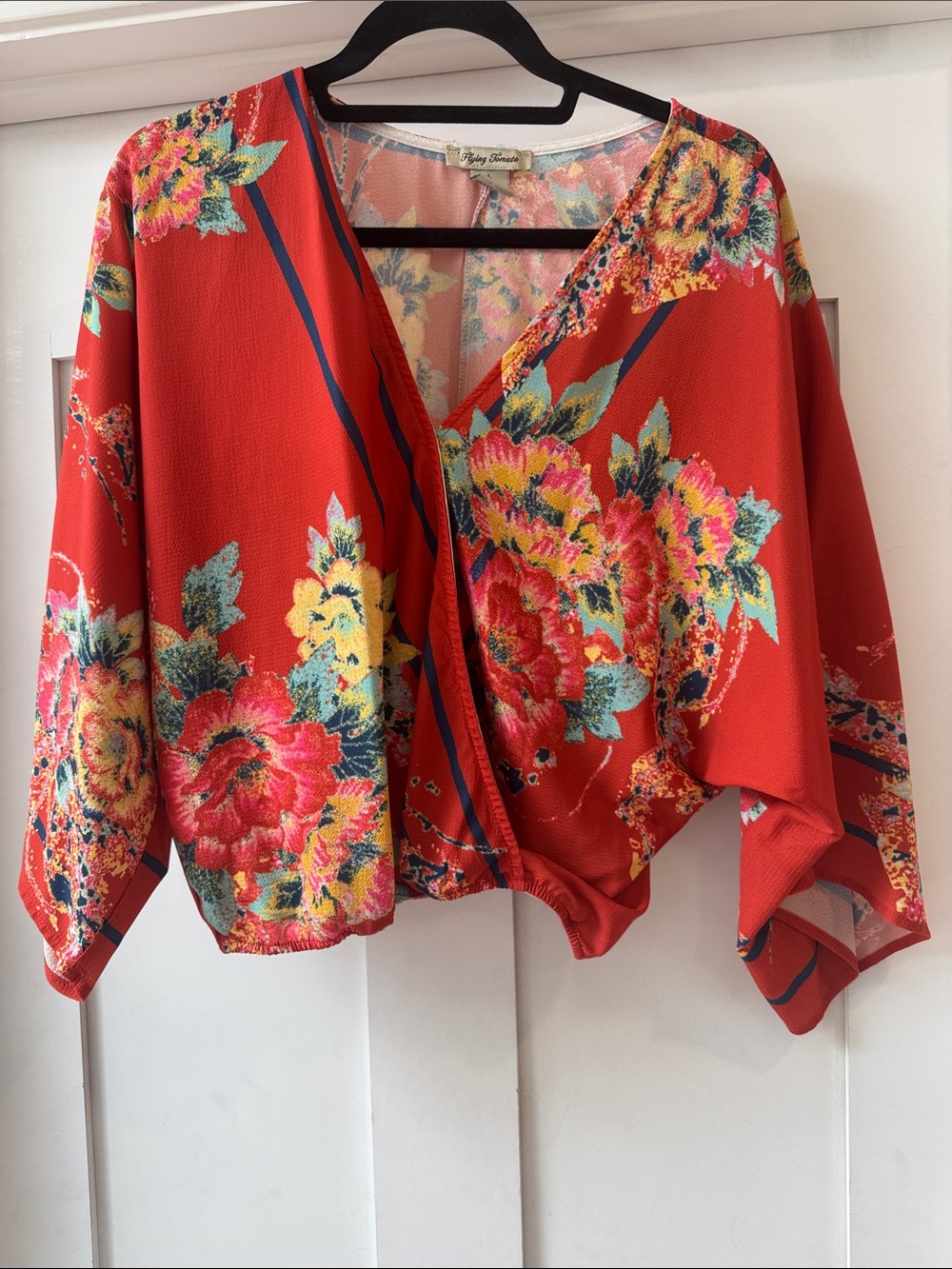 Women’s wrap, blouse size large